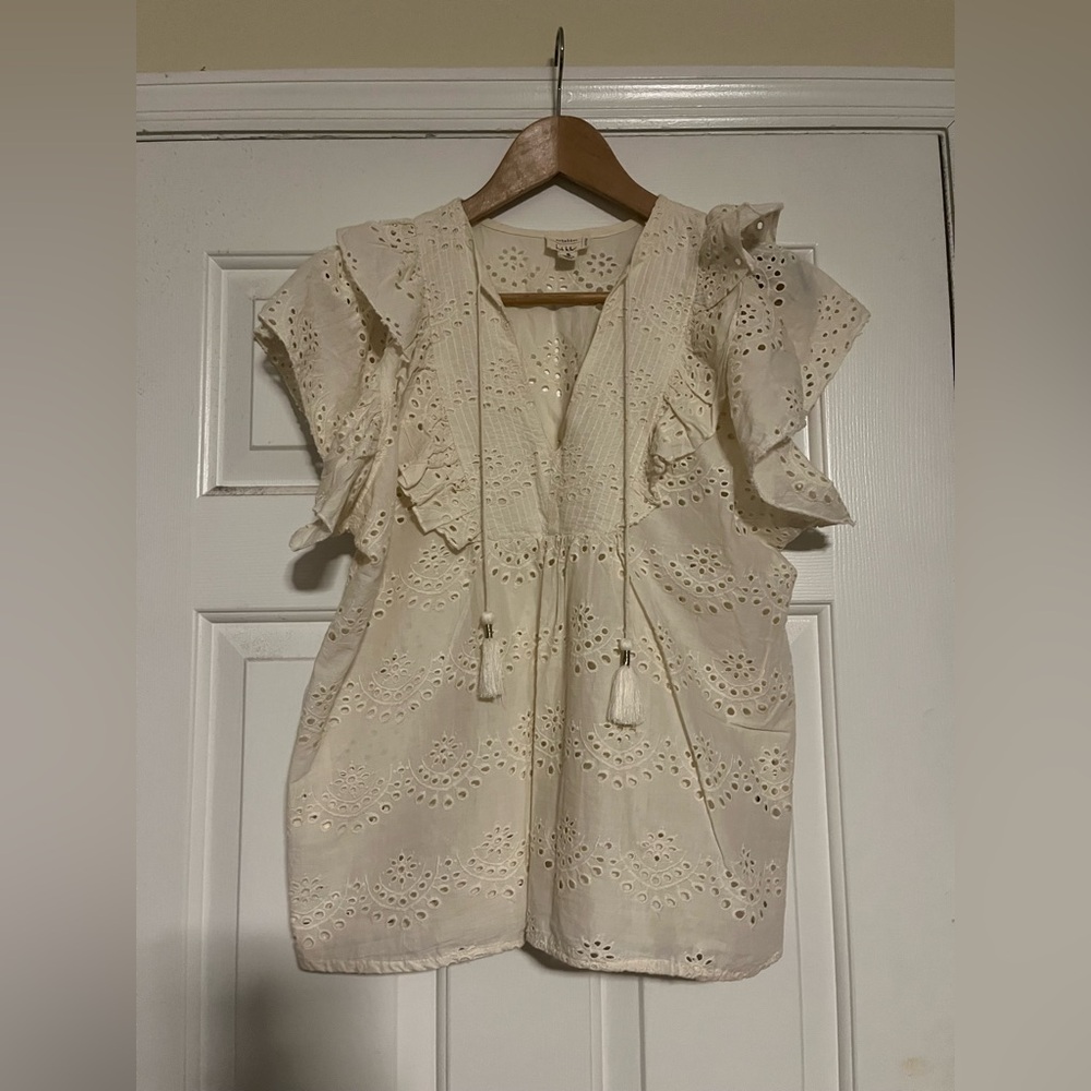 artilier nicole miller crème eyelet top with flutter sleeves